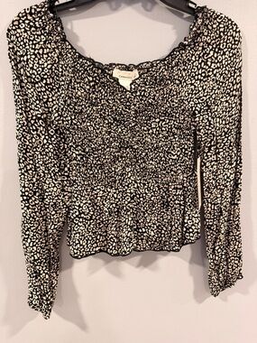 Black and White Smocked Peplum Long-Sleeve Top
